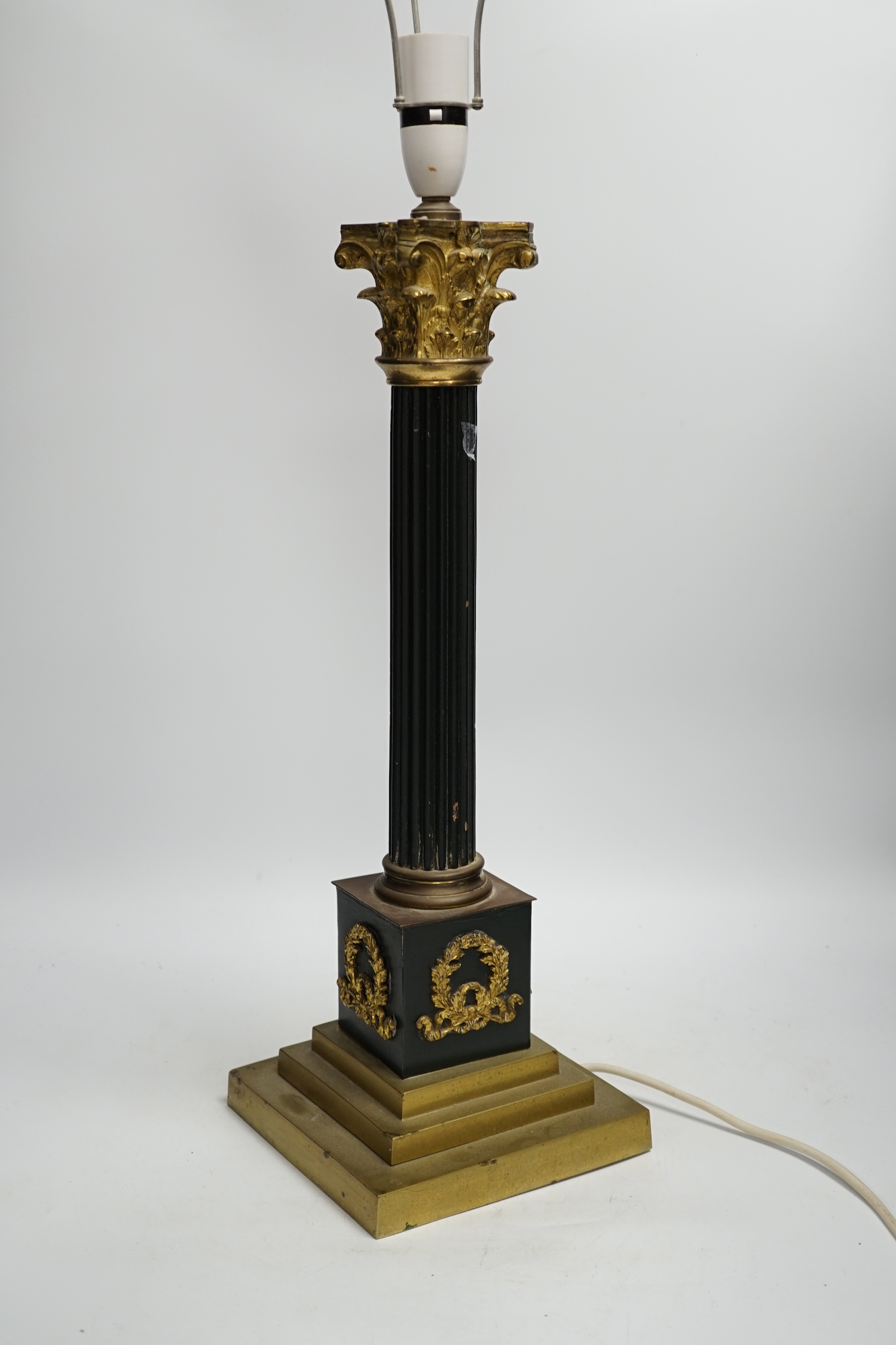 A Corinthian column desk lamp, with laurel wreath panels to base, 56cm